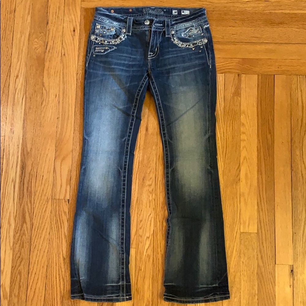 Miss Me signature rise boot cut jeans.